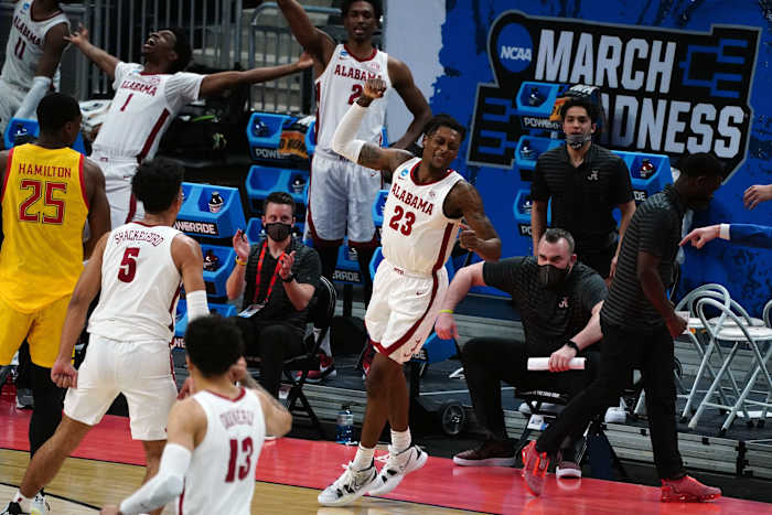 Alabama Crimson Tide guard John Petty Jr. (23) reacts after a play in the second half against the Maryland Terrapins in the second round of the 2021 NCAA Tournament at Bankers Life Fieldhouse.